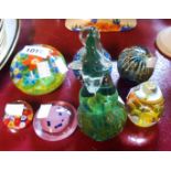 Seven glass paperweights including Mdina, etc.