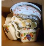 A box containing assorted ceramic items including a set of six Royal Doulton 'Bunnykins' egg cups,