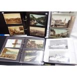 Three ring bound albums containing collections of early 20th Century and other postcards including