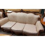 A reproduction ornate part show frame three piece suite comprising a pair of fauteuil armchairs