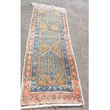 An old handmade wool runner with polychrome triple motifs within a double border - wear - 2.35m X