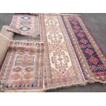 Two modern Belgian machine made viscose runners and two smaller rugs - all of various design -