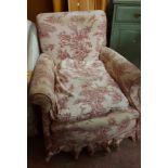 A 20th Century armchair with French style printed upholstery