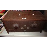 A 1920's/30's Cossor Empire Melody Maker Model 234 valve radio, with wooden case and Bakelite dials