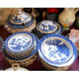 A large quantity of Booths dinner ware in the Real Old Willow pattern including soup tureen, plates,