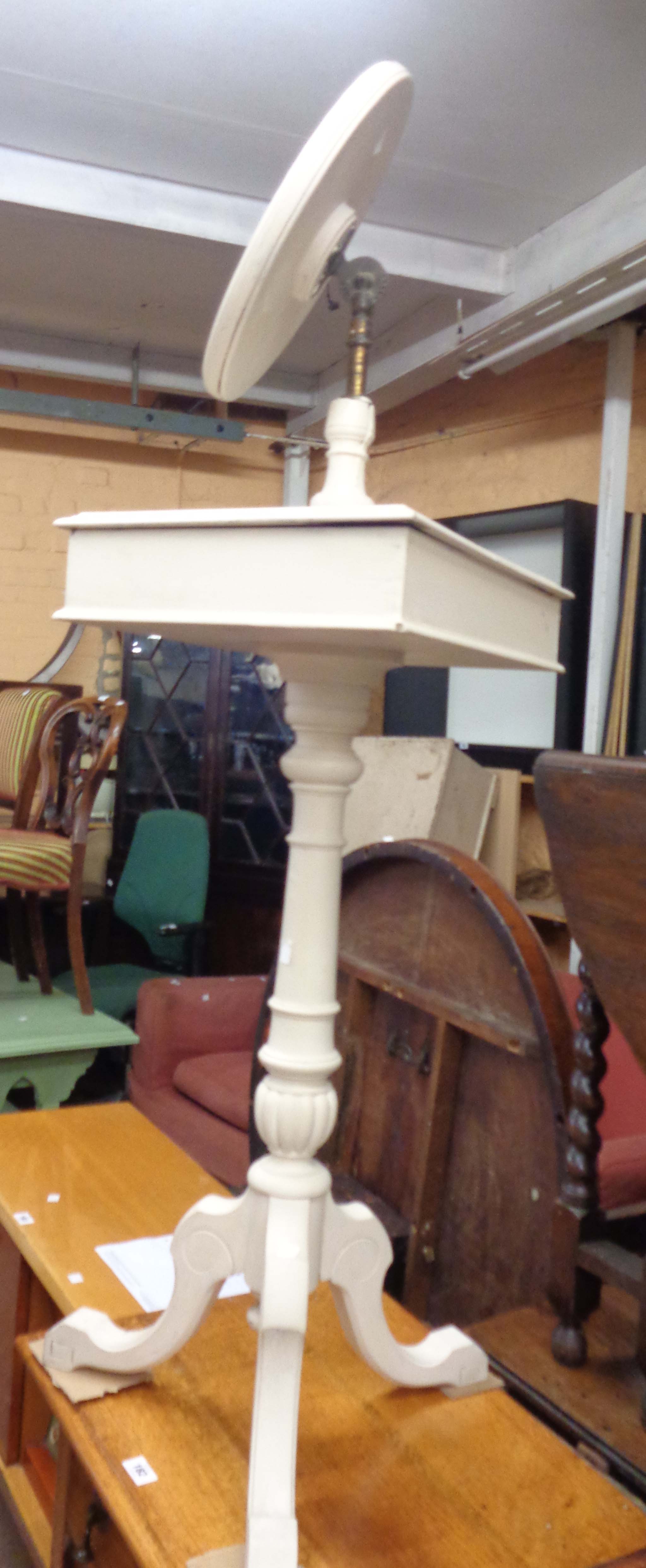 An old nightstand with circular swing mirror, set on turned pillar with tripod base - later white