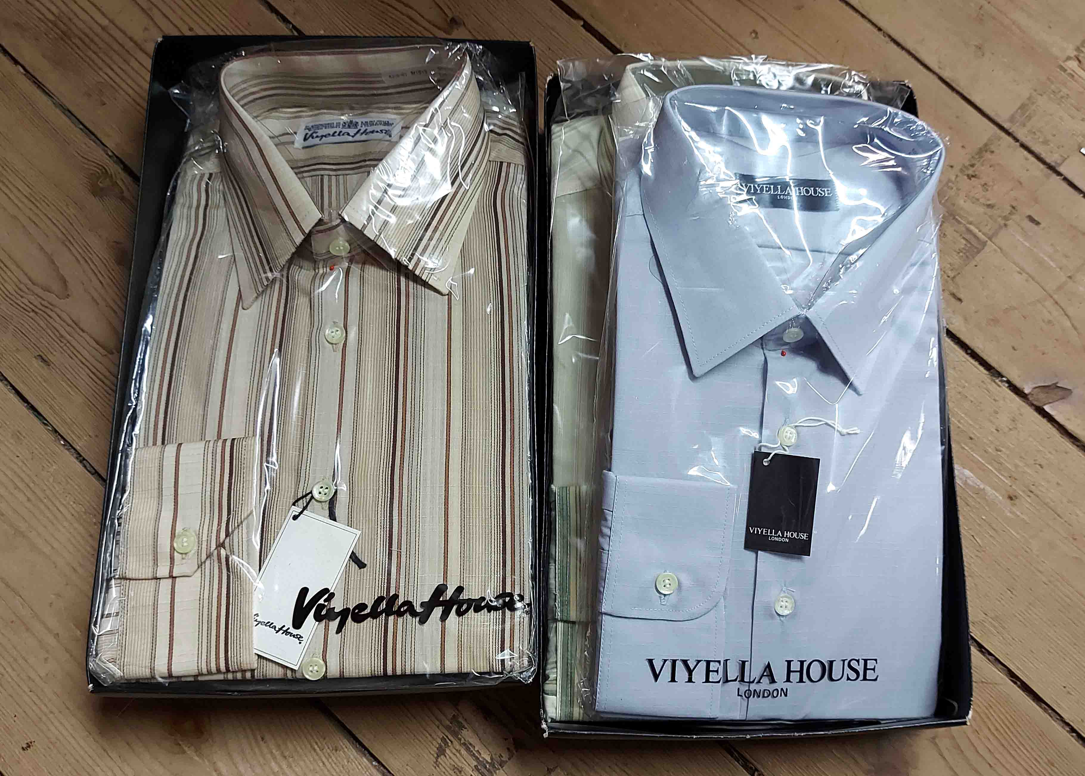 Five vintage unopened Viyella House fashion shirts, contained in two branded boxes