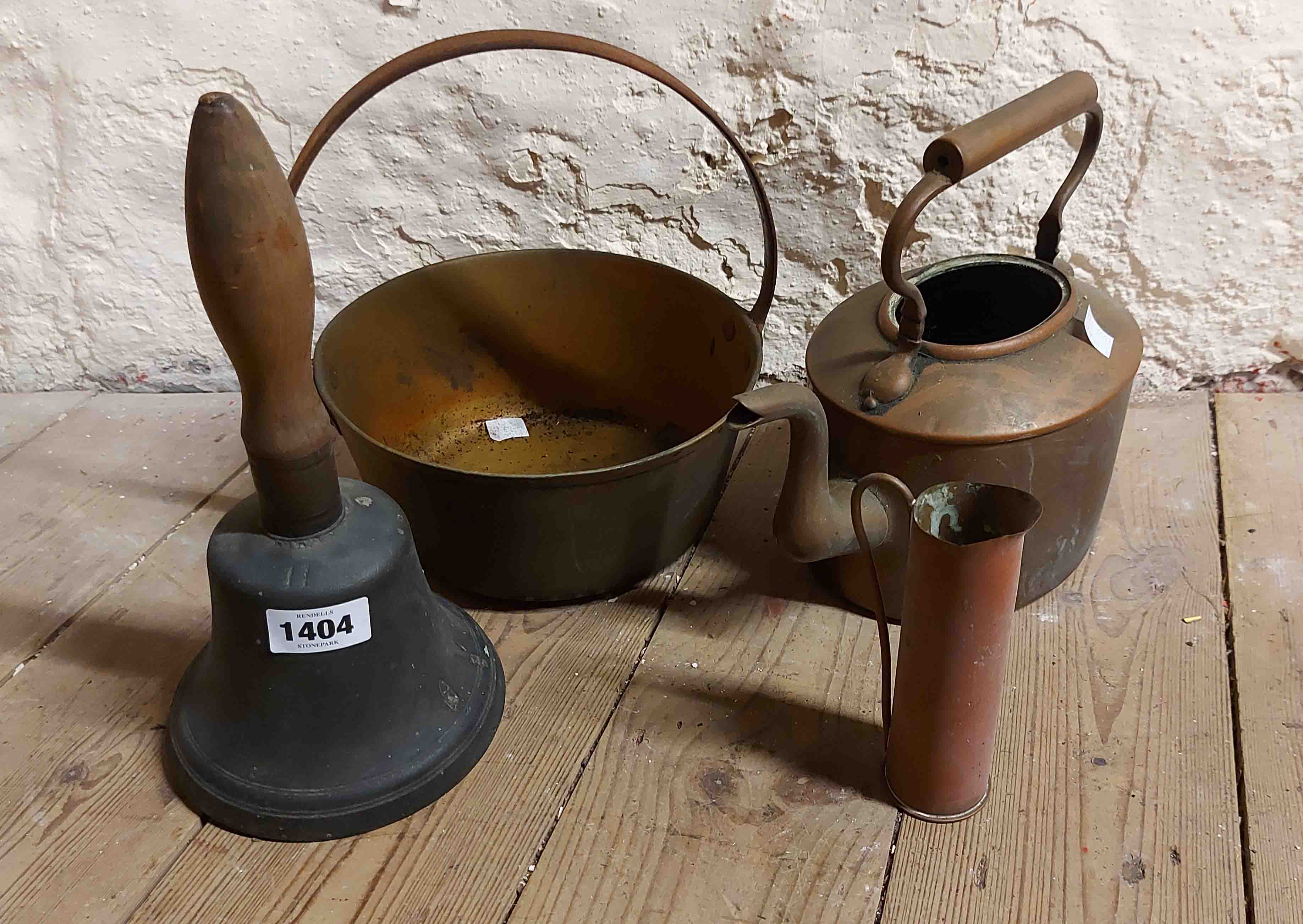 A large cast bronze school type bell with turned wood handle - sold with a Trench Art ewer made from