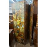 An early 20th Century four fold dressing screen with decoupage decoration