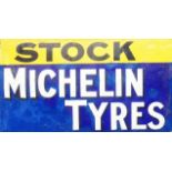 A large vintage enamel advertising sign for 'Michelin Tyres'
