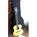 A Woodstock 3/4 size acoustic guitar, with Stag hybrid hard shell carry case