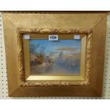 A wide gilt framed continental watercolour, depicting a mountain lakeside building and sailing