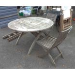 A John Lewis weathered teak garden table of slatted design - sold with two folding chairs to match