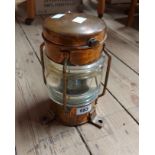 A vintage copper ships lantern with triple mount and glass lens