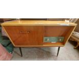 A 92cm polished wood cased Phillips radiogram with receiver