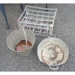 A vintage galvanised bottle crate with pierced initials 'D.C.' - sold with a galvanised bucket and