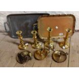 A quantity of assorted metalware including two pairs of brass candlesticks, two chambersticks,