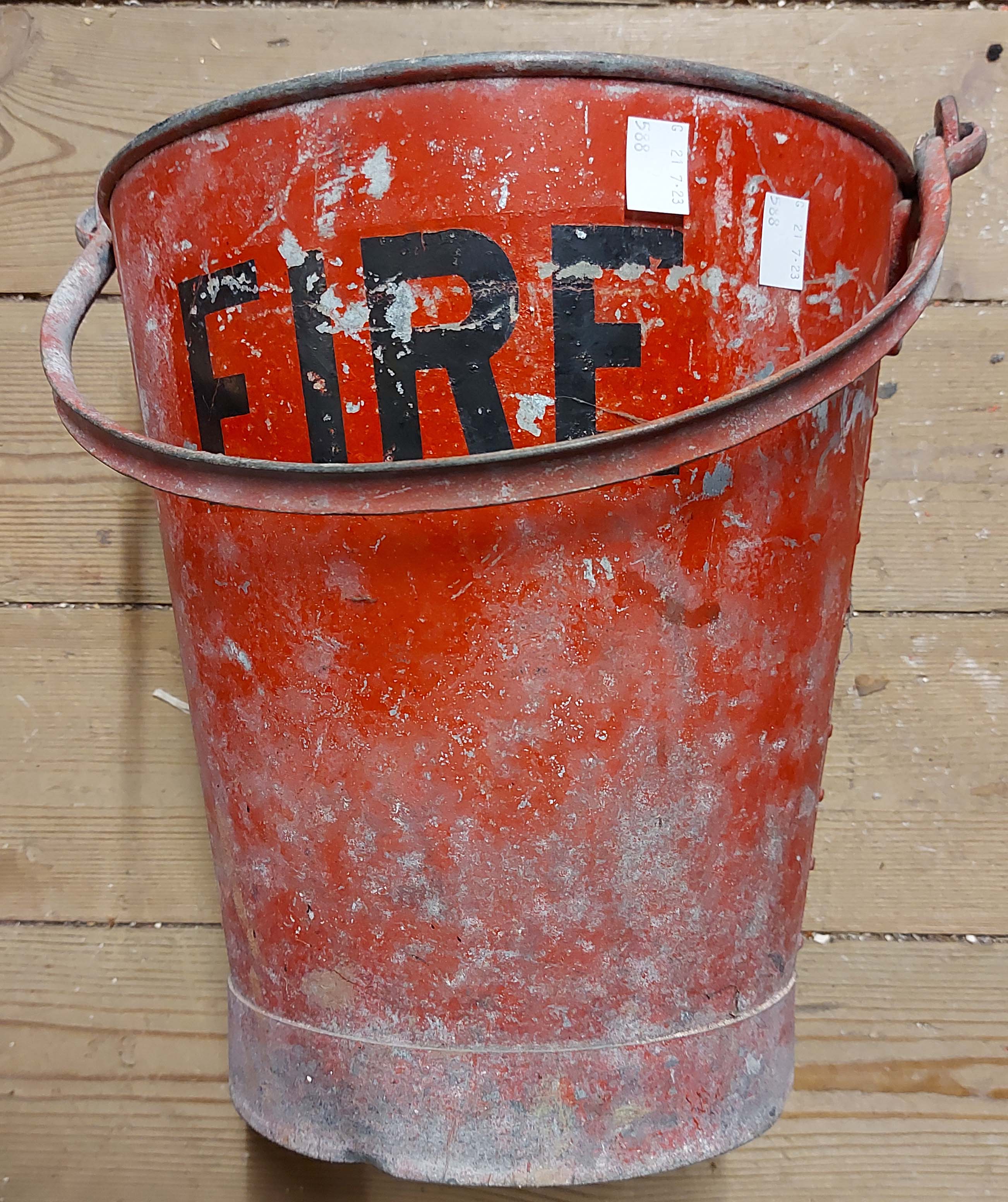 A vintage fire bucket with black lettering on a red ground with a galvanised interior - sold with - Image 2 of 2