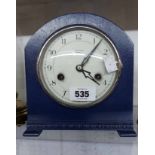 A 1930's Smiths Enfield mantel clock with later blue painted finish and eight day gong striking