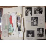 A red folder containing a personal collection of mid 20th Century ephemera including photographs and