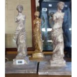 Three plaster models depicting classical Roman female statues, with antiqued finish