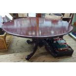 A 1.4m Victorian mahogany tilt-top breakfast table with moulded oval top, set on massive turned