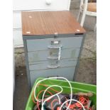 A vintage Bisley metal four drawer filing cabinet with grey painted finish