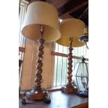 A pair of modern tall oak barley twist table lamps - with shades