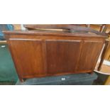 A 91cm vintage stained mixed wood lift-top linen chest with panelled front