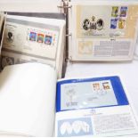 A Postal Heritage Society ring bound album containing Queen Elizabeth II Silver Jubilee FDCs -