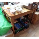 A 1.04m old pine scrub top kitchen table with drawer to one end, set on turned legs