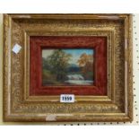 An early 20th Century ornate gilt framed and velvet slipped oil on card, depicting a woodland