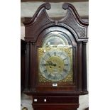 A late 18th Century mahogany and strung longcase clock with blind fretwork decoration to the swan