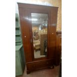 A 96cm Edwardian inlaid mahogany single wardrobe with hanging space enclosed by a bevelled mirror