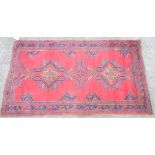 A modern handmade wool Tabriz style rug with central motifs within a wide border on red ground - 2.