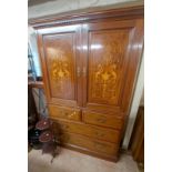 A 1.3m Edwardian inlaid and strung mahogany compactum wardrobe with hanging space and slides over