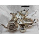 A silver plated harlequin four piece tea set - sold with a plated spirit kettle