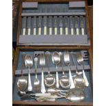 A vintage oak canteen containing a six place setting of silver plated cutlery, also some other