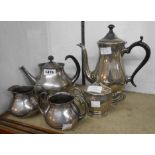 Eric Clements: a silver plated Mappin & Webb 'Clements' pattern three piece tea set with open curved