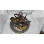 A silver plated three piece tea set on an associated tray - sold with two goblets and a small