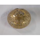 An old Chinese brass lidded pot with all over symbols and panelled decoration