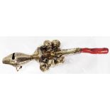 A continental 800 grade white metal baby's rattle with whistle to top, pendant bells and red coral