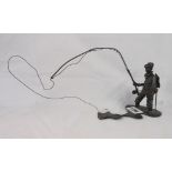 A vintage bronze figure, depicting a fisherman in water casting a line - signed JE 77