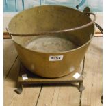 An old brass preserve pan with iron swing handle - sold with a wrought iron and copper kettle stand