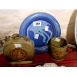 A Tremar Pottery Cornwall mug with moulded Celtic cross design - sold with a similar flask and a