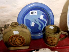 A Tremar Pottery Cornwall mug with moulded Celtic cross design - sold with a similar flask and a