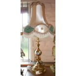 A modern cast brass table lamp of candlestick form - sold with a shade
