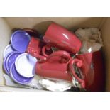 A box containing a quantity of ceramic mugs and coaster
