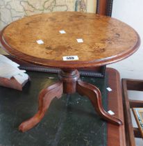 A 46cm diameter antique inlaid walnut low pedestal table, set on turned pillar and tripod base