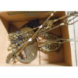 A box containing a quantity of brass and other items including toasting forks, trivets, etc.